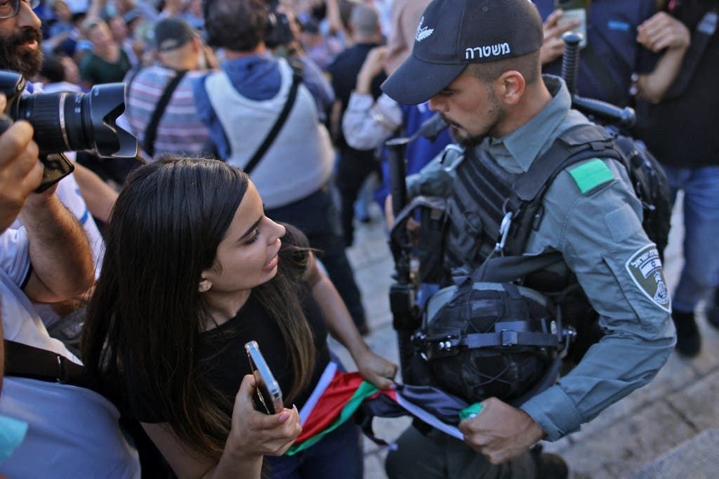 من مواجهات مسيرة الأعلام في القدس
