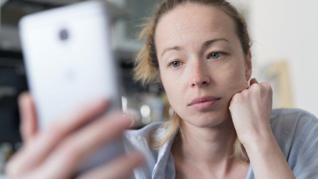 worried-sad-woman-phone-video-call
